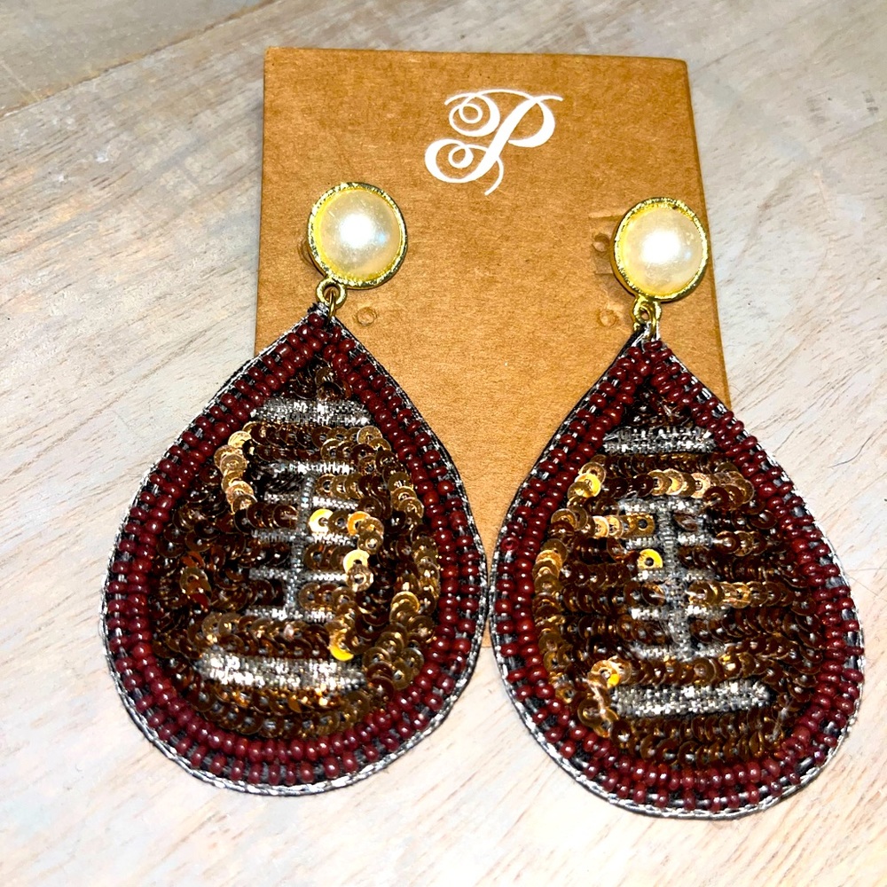 Sequin football earrings plunder design